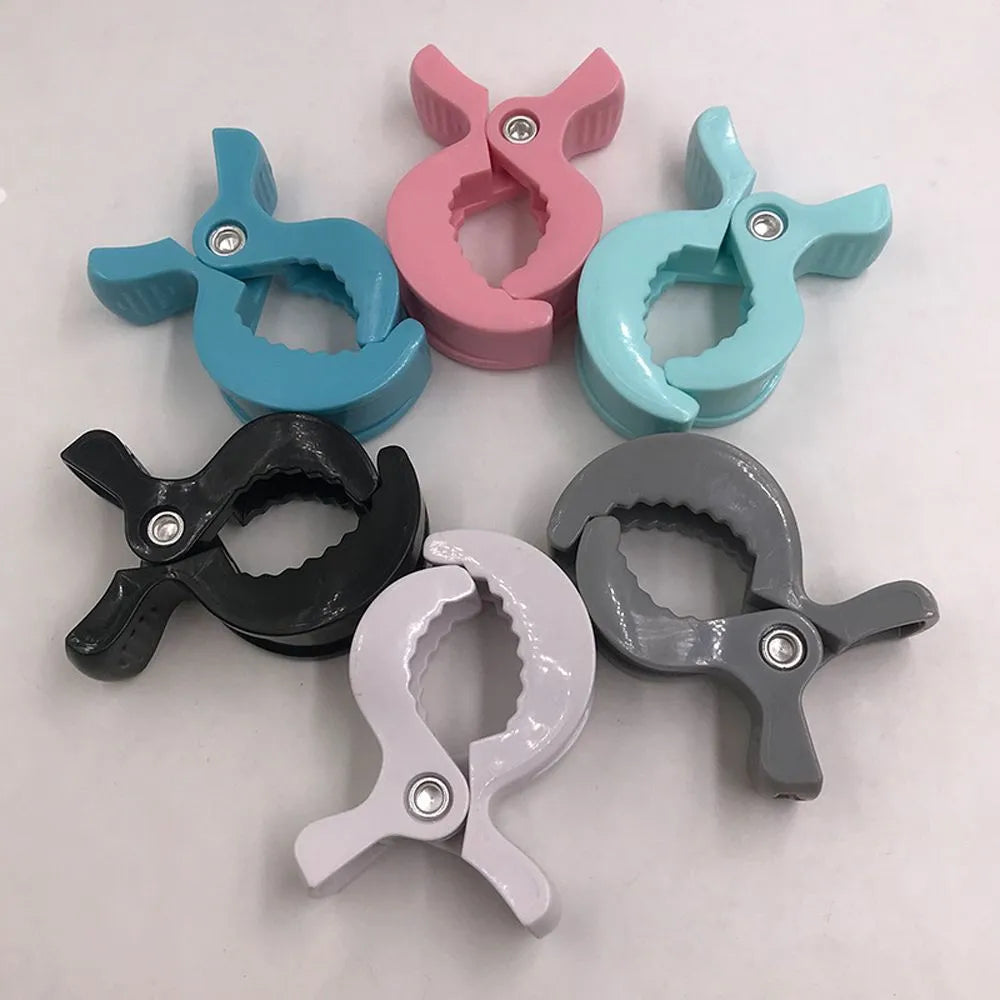 Baby stroller clamp